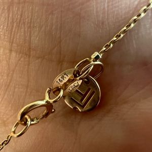 14k gold chain with 14k WG twinkles.  Logan Hollowell.